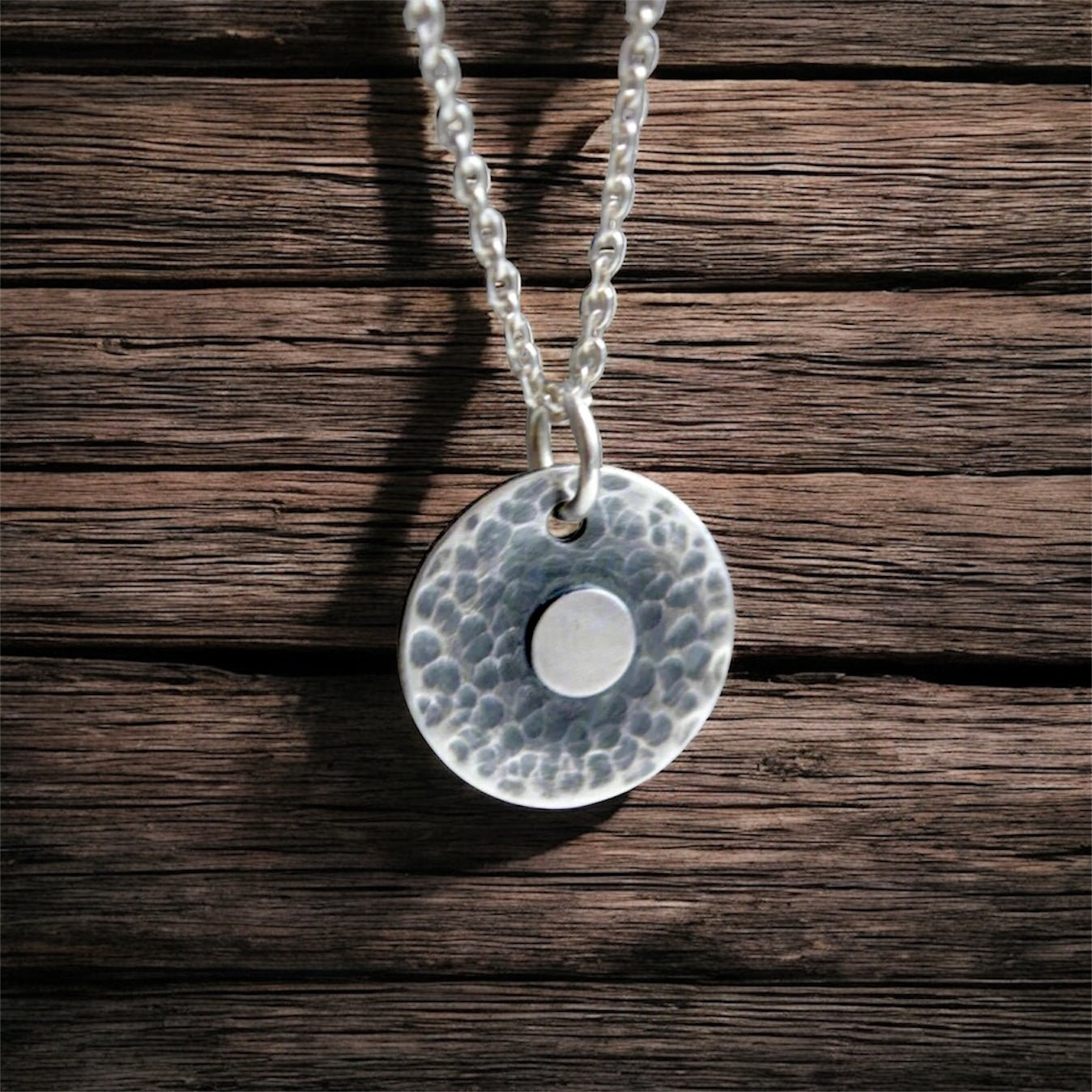 Hammered disc, sterling silver necklace.