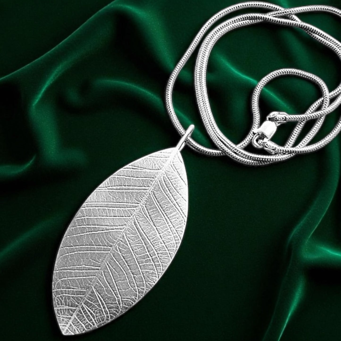 Large sterling silver leaf necklace.