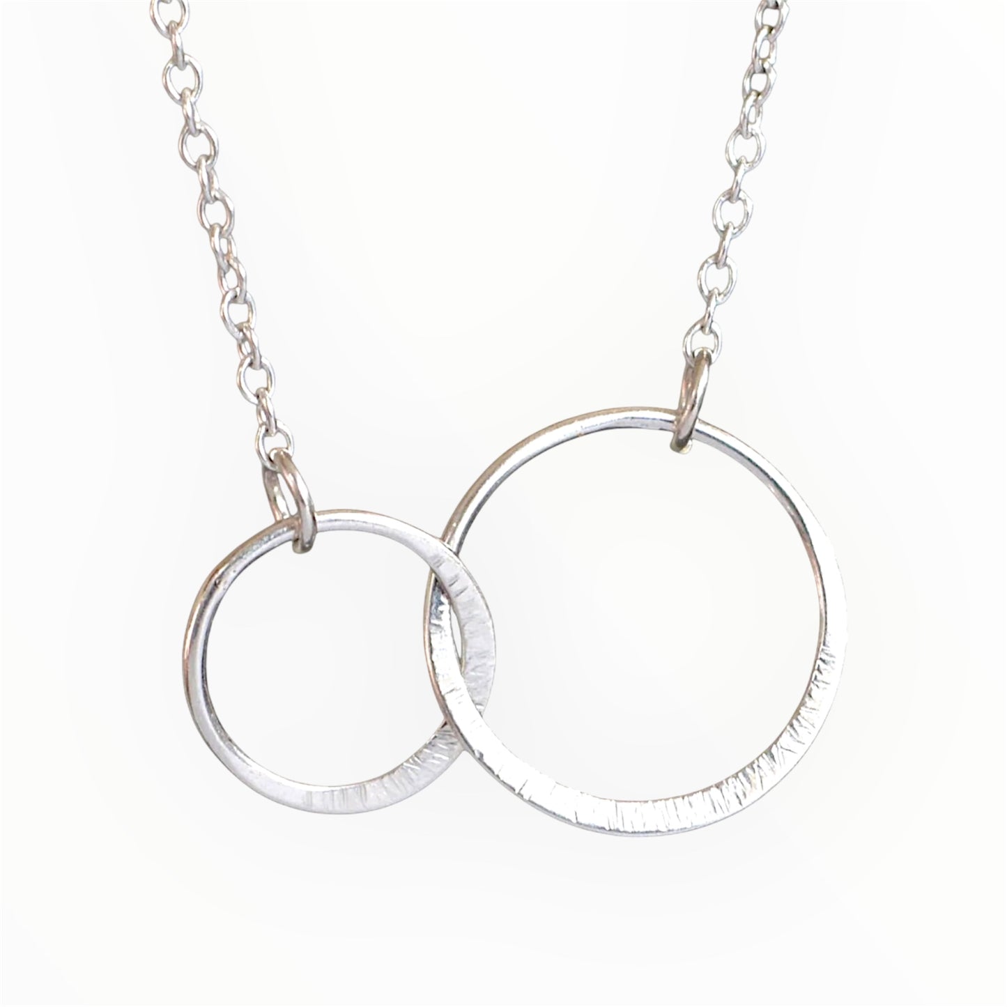 Sterling silver infinity necklace.