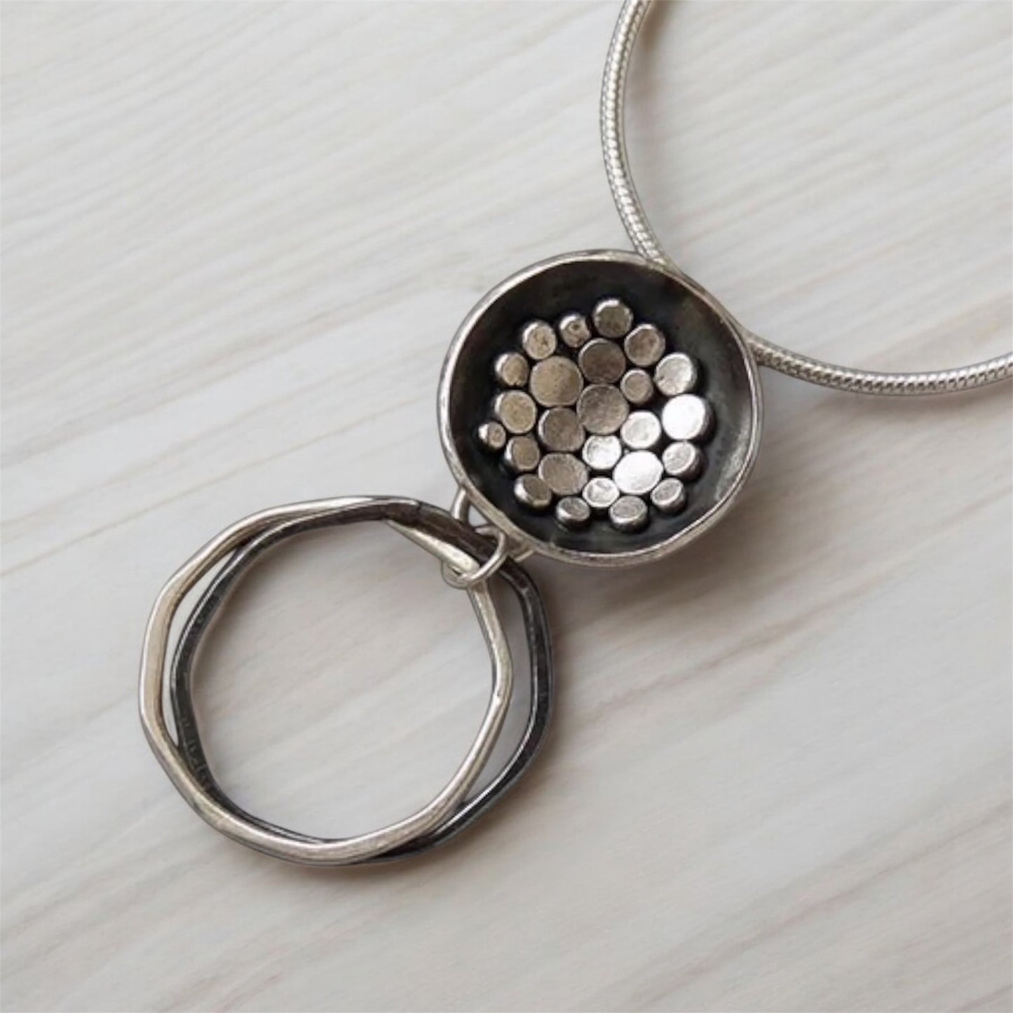 Handmade oxidised sterling silver bowl pendant necklace.