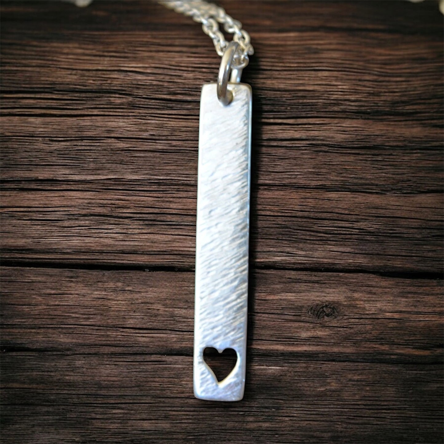 Hammered heart sterling silver rectangular necklace.