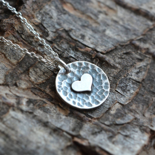 Sterling silver heart disc pendant