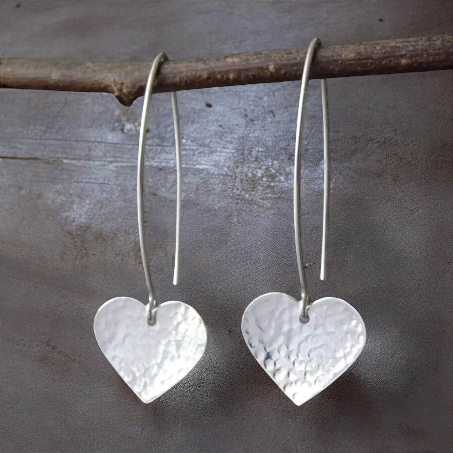 Sterling silver dangle heart earrings