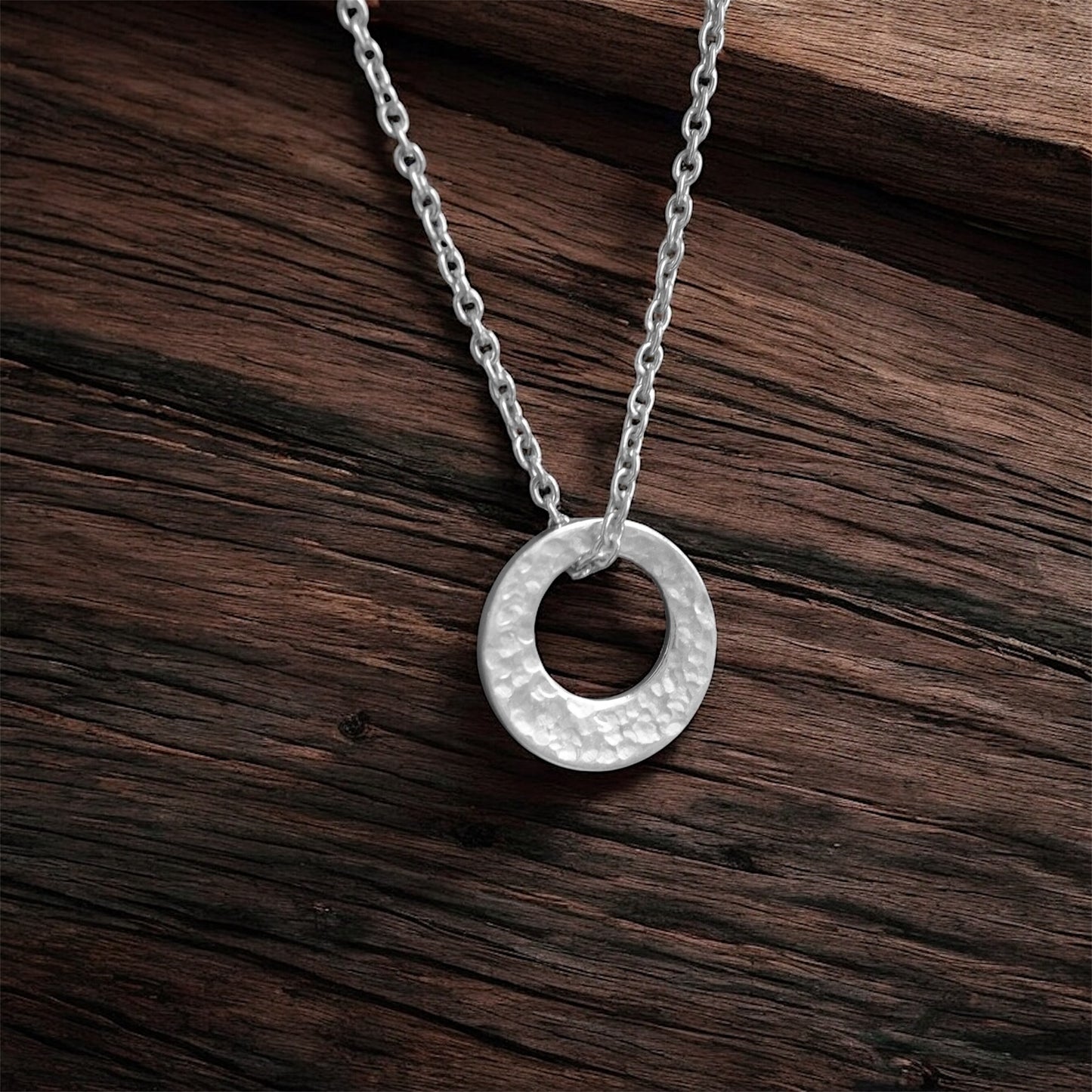 Small minimalist hammered sterling silver necklace.
