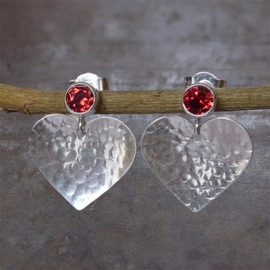 Garnet January birthstone sterling silver heart stud earrings.