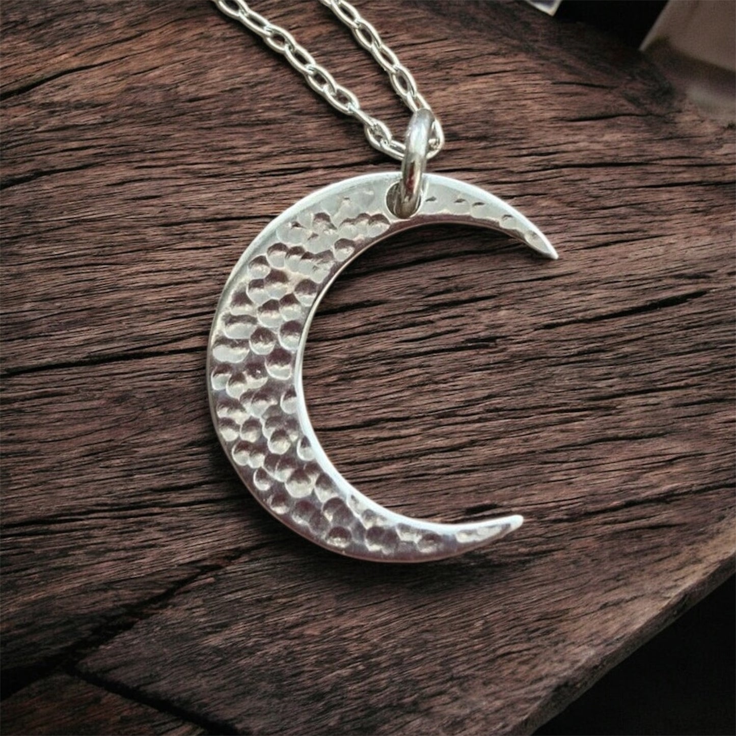 Crescent moon sterling silver necklace.
