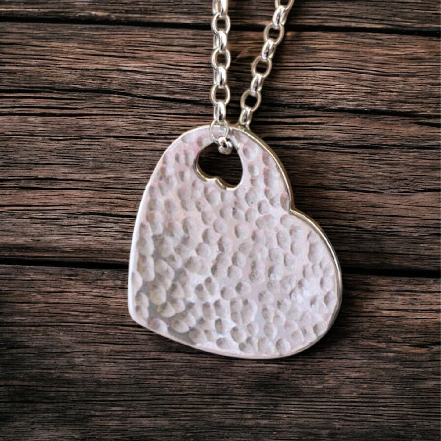 Hammered sterling silver heart necklace pendant.