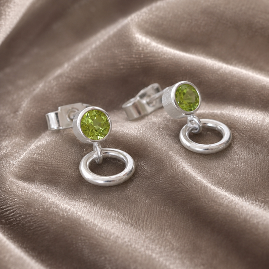 Peridot and circle sterling silver stud earrings.