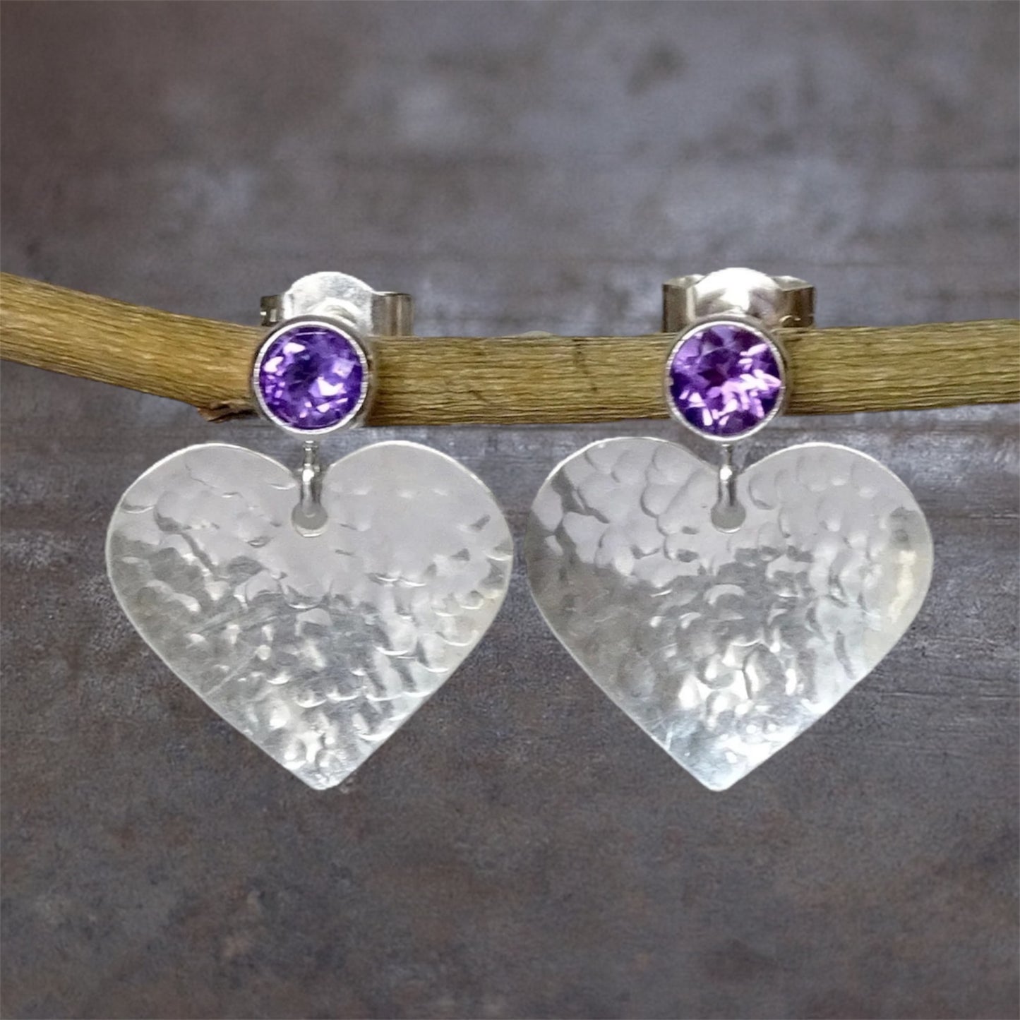 Amethyst February birthstone sterling silver heart stud earrings.