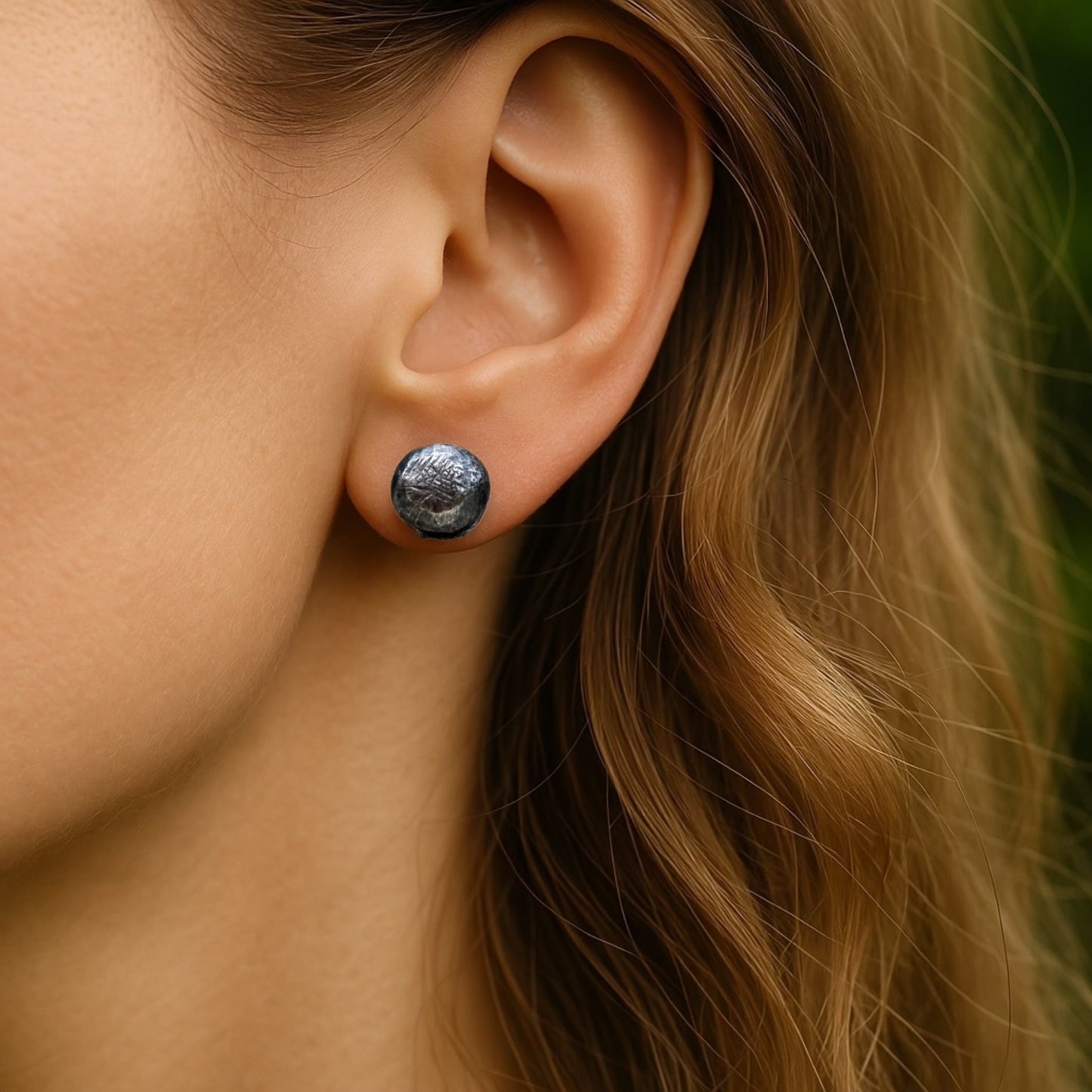 Oxidised sterling silver pebble stud earrings.