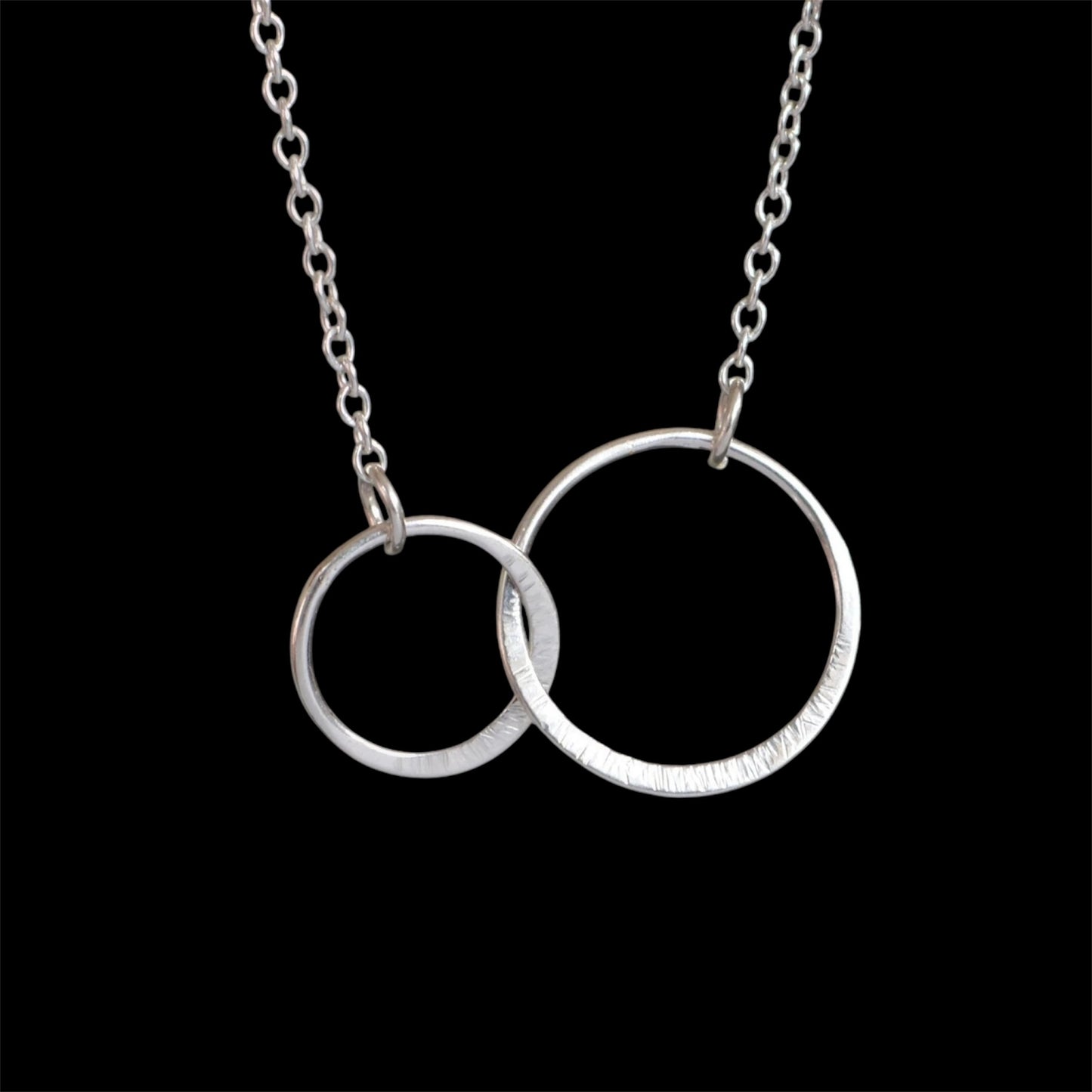 Sterling silver infinity necklace.