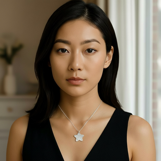 Sterling silver star necklace.