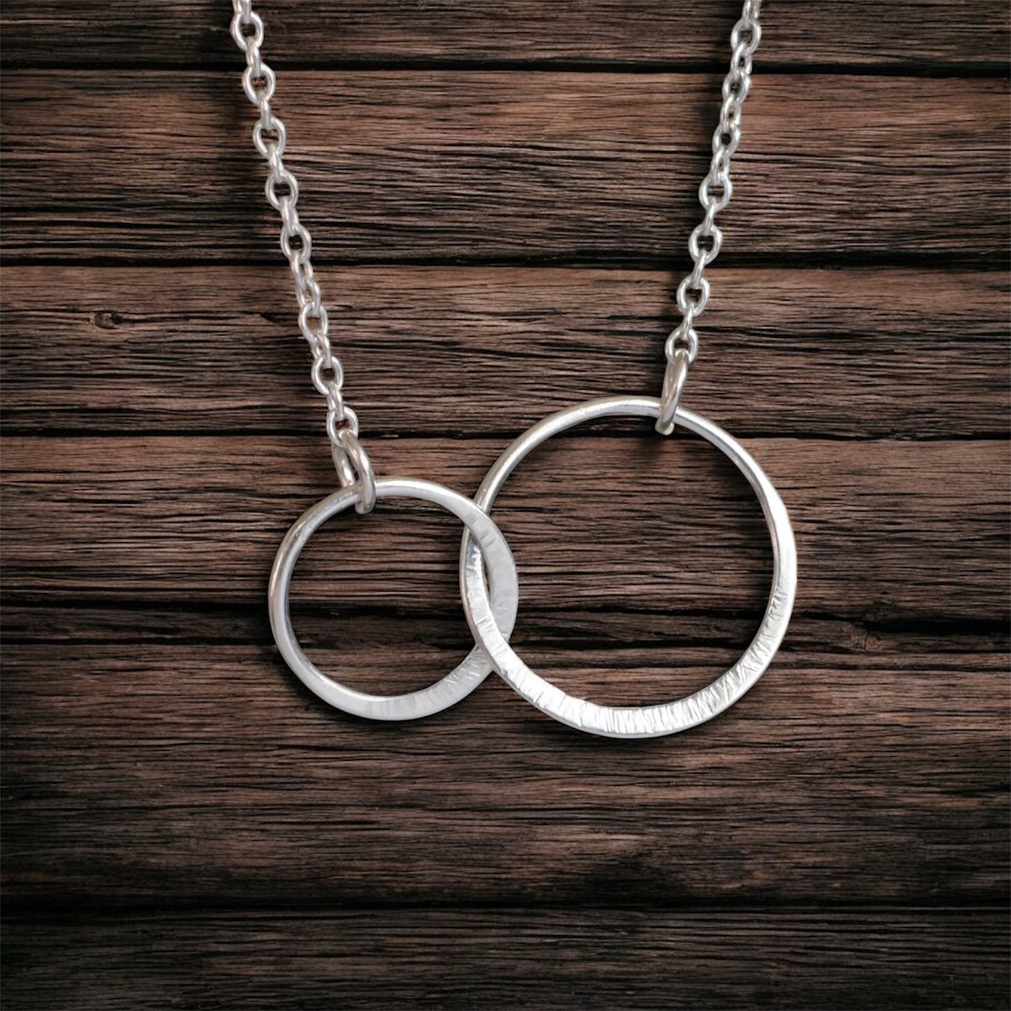 Sterling silver infinity necklace.