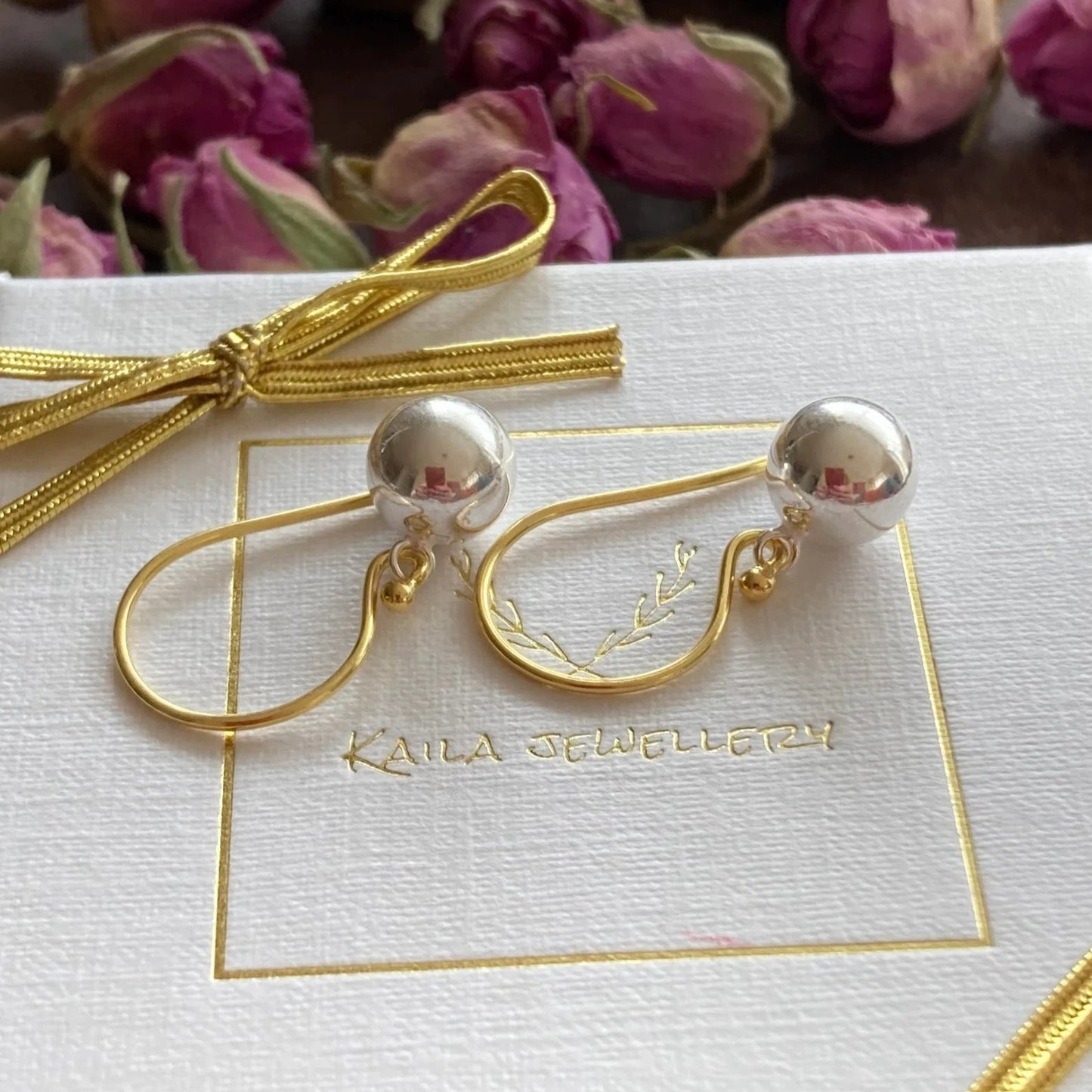 Gold and silver ball dangle earrings