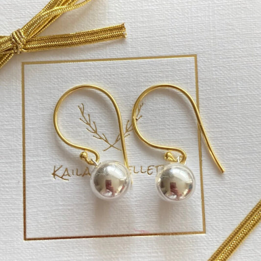 Gold and silver ball dangle earrings