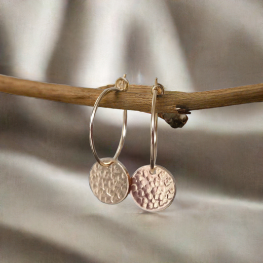 14k Gold filled hammered disc hoop earrings.