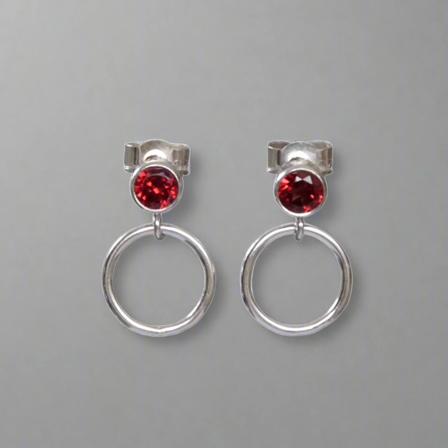 sterling silver garnet and circle stud earrings