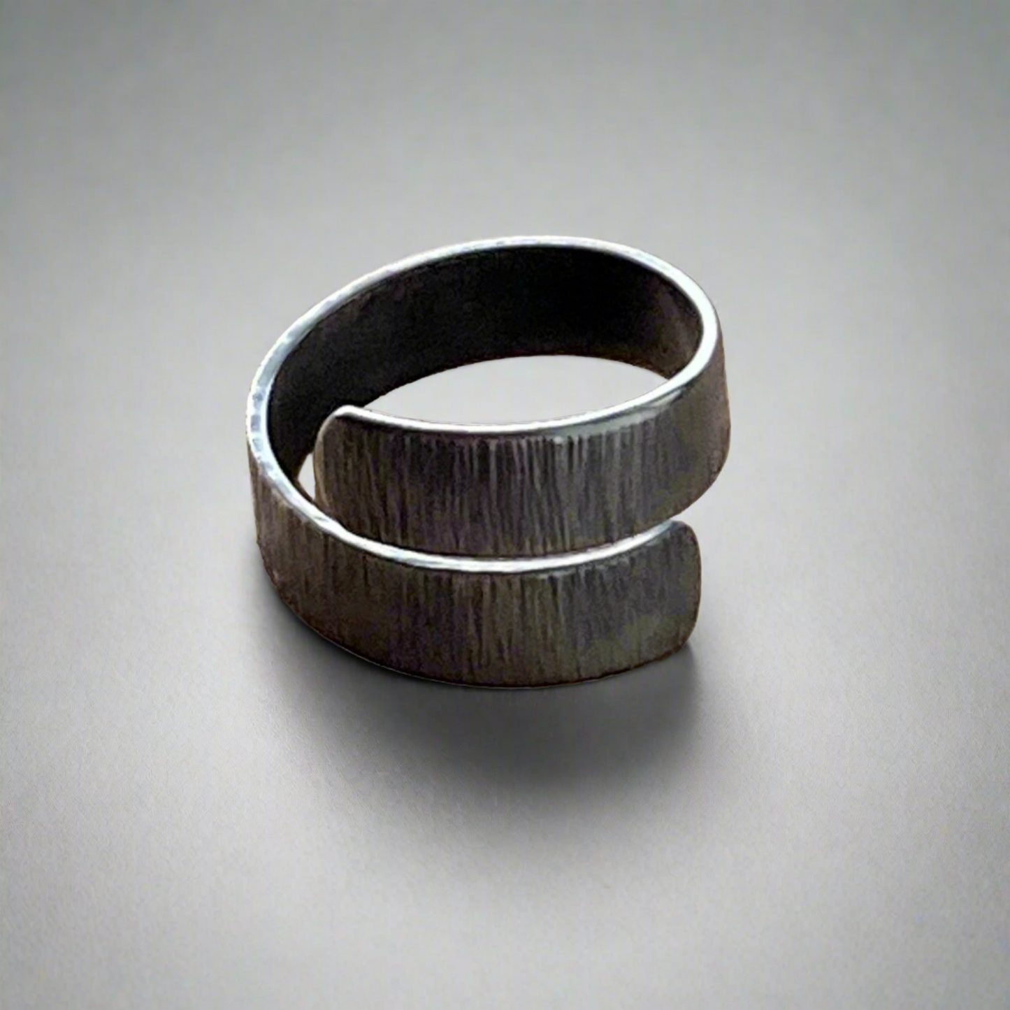 Oxidised sterling silver textured adjustable ring.