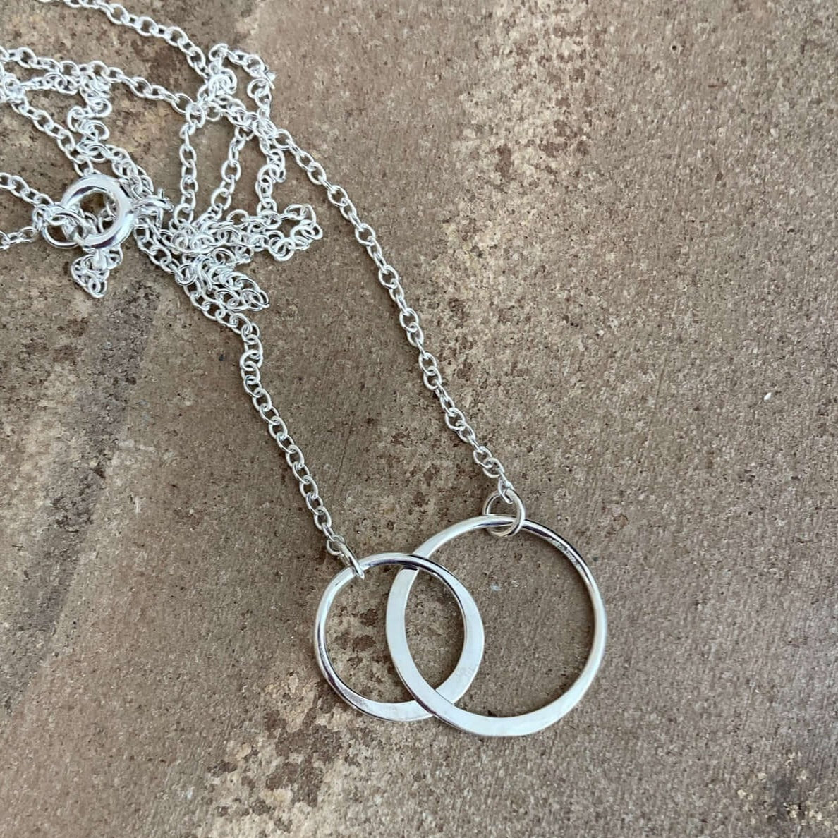 Sterling silver interlocking circles necklace.