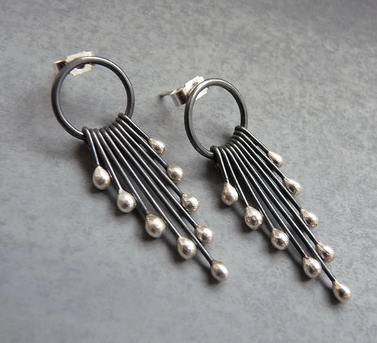 Sterling silver oxidised circle and droplets stud earrings.
