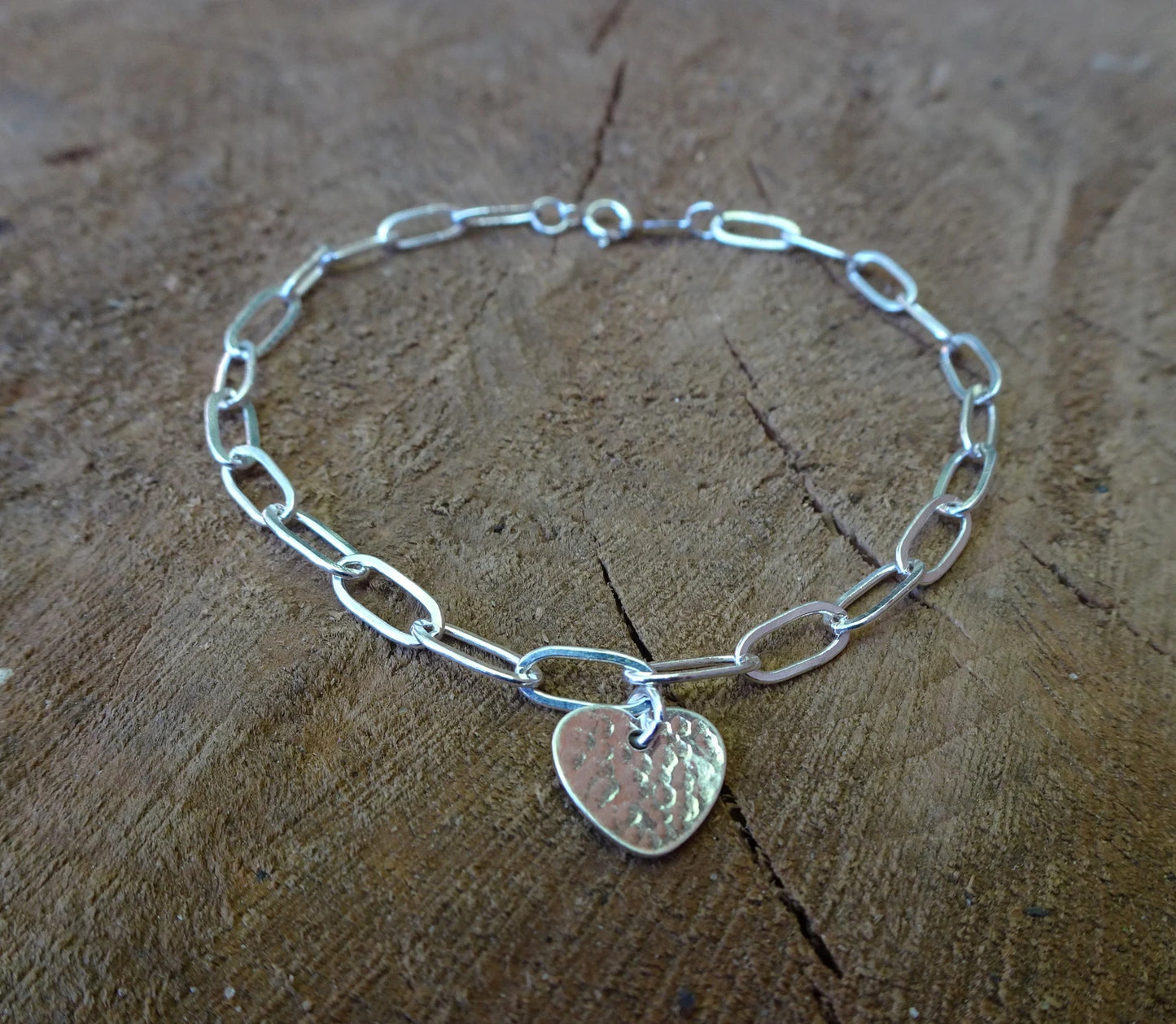 Sterling silver disc charm cable chain bracelet.