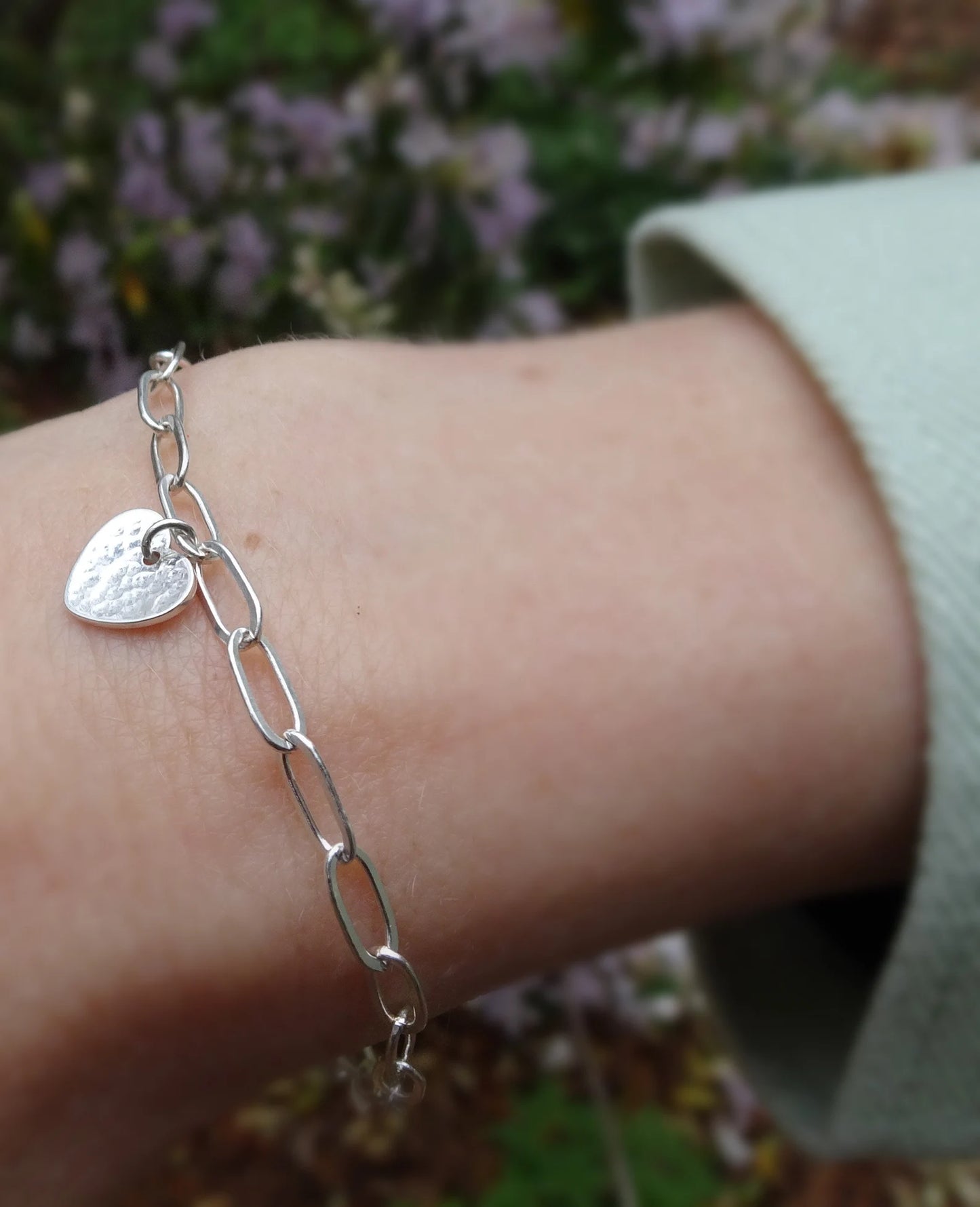 Sterling silver disc charm cable chain bracelet.