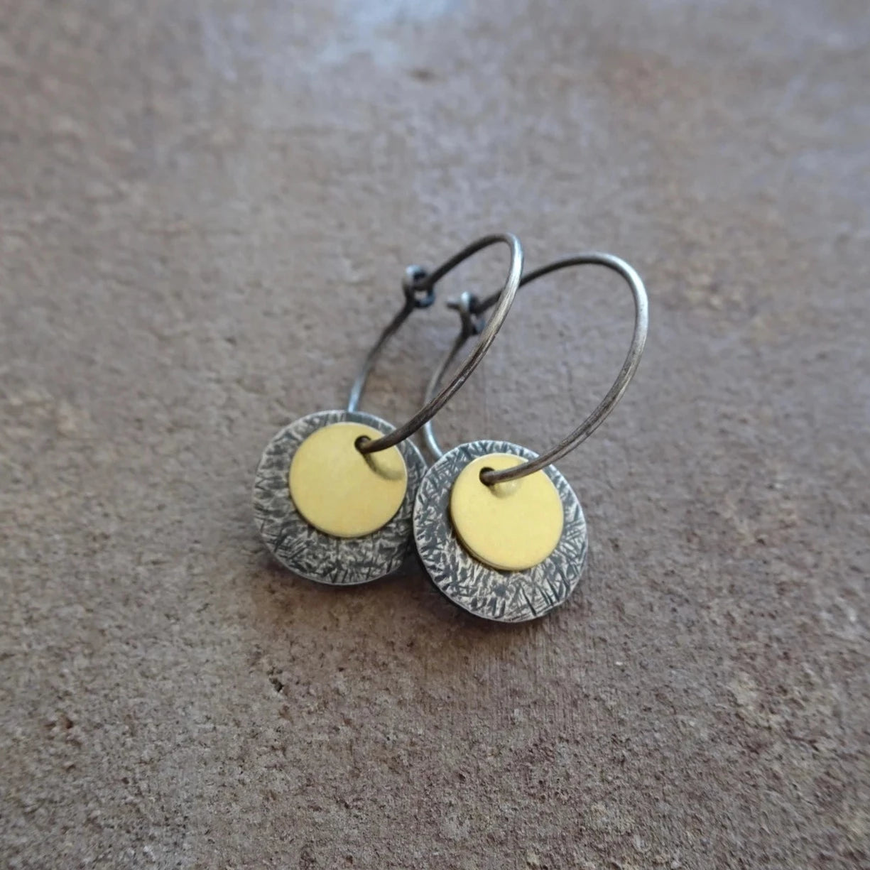 Gold vermeil, oxidised sterling silver disc hoop earrings.