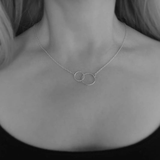 Sterling silver infinity necklace.