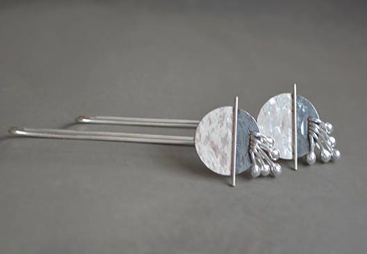 Long sterling silver drop earrings.