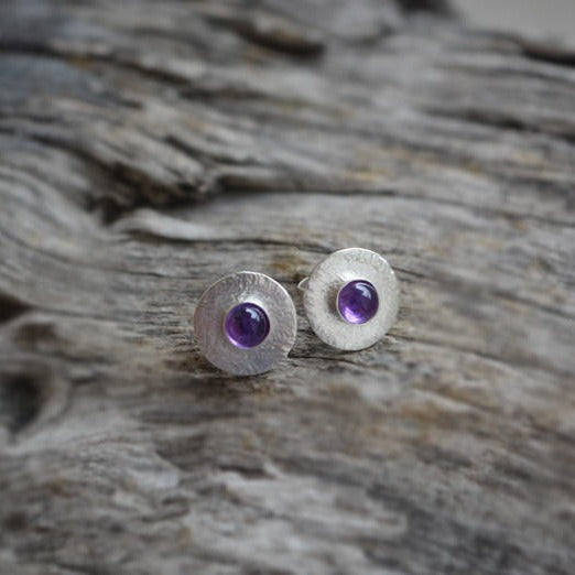 Amethyst sterling silver textured disc earrings.