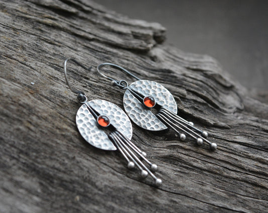 Garnet sterling silver earrings.