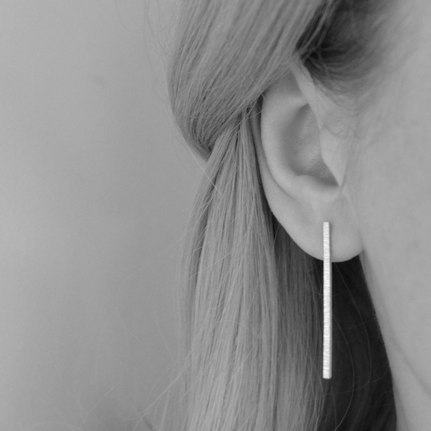 Oxidised sterling silver bar stud earrings.
