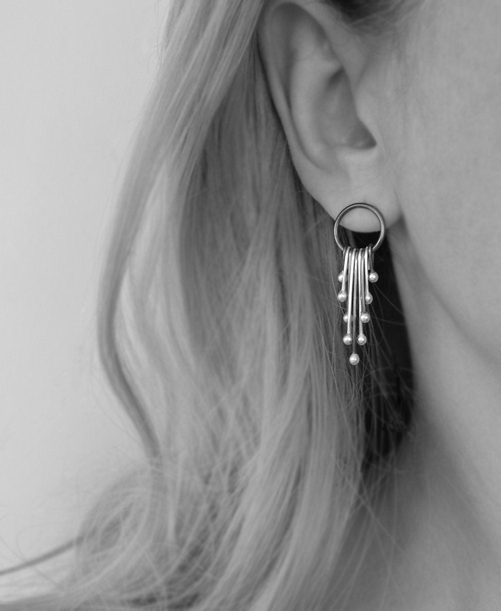 Handmade long sterling silver stud earrings.