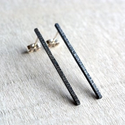Oxidised sterling silver bar stud earrings.
