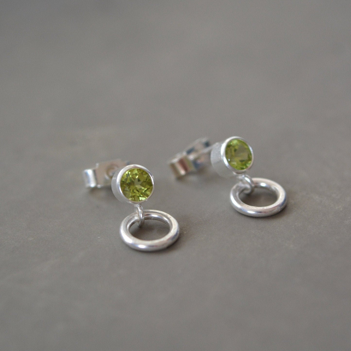 sterling silver peridot earrings with dangle circle