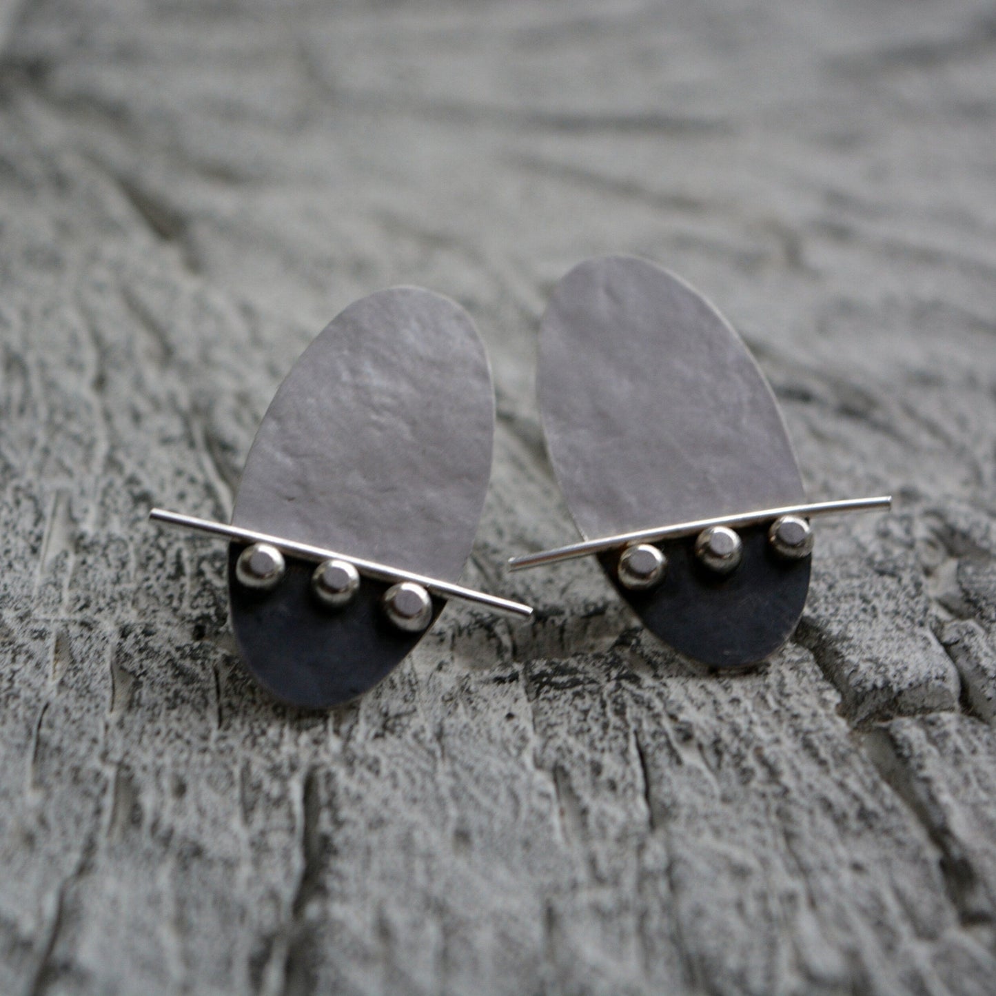 Sterling silver oval textured stud earrings. Oxidised earrings.