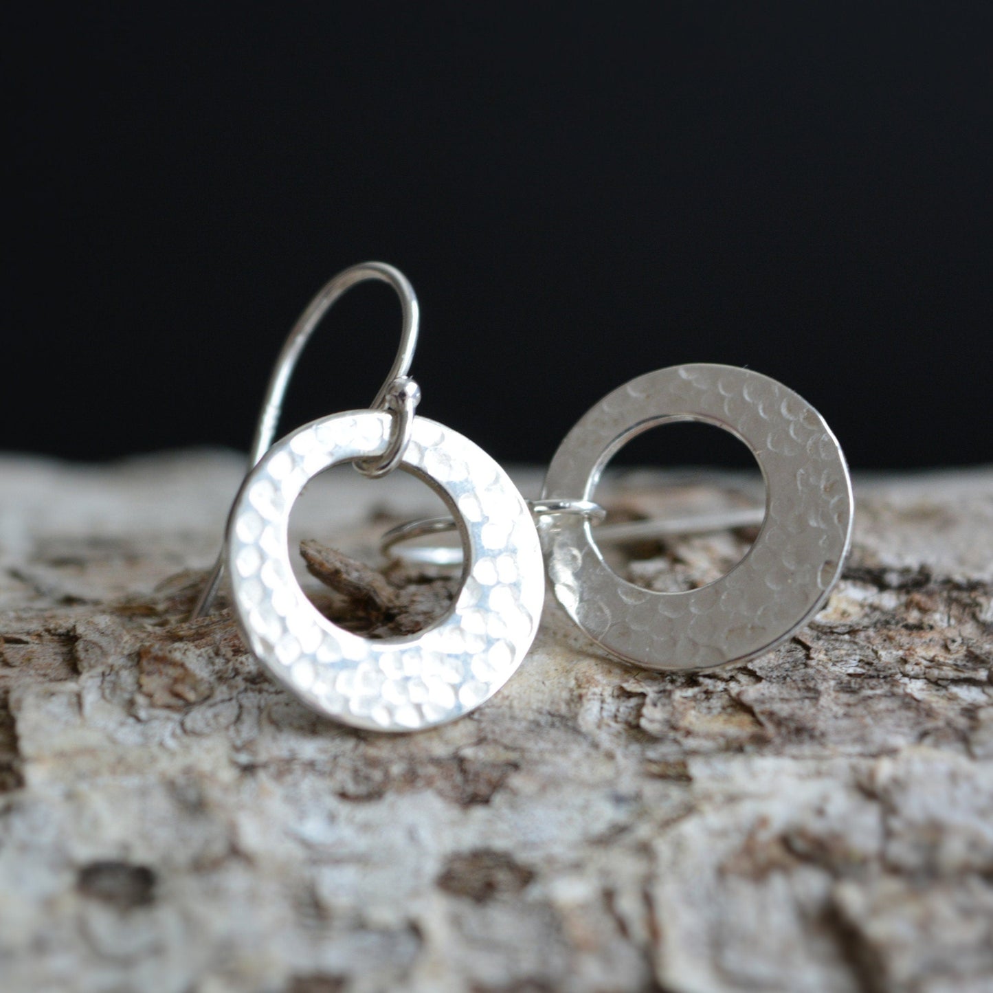 Hammered circle sterling silver earrings.