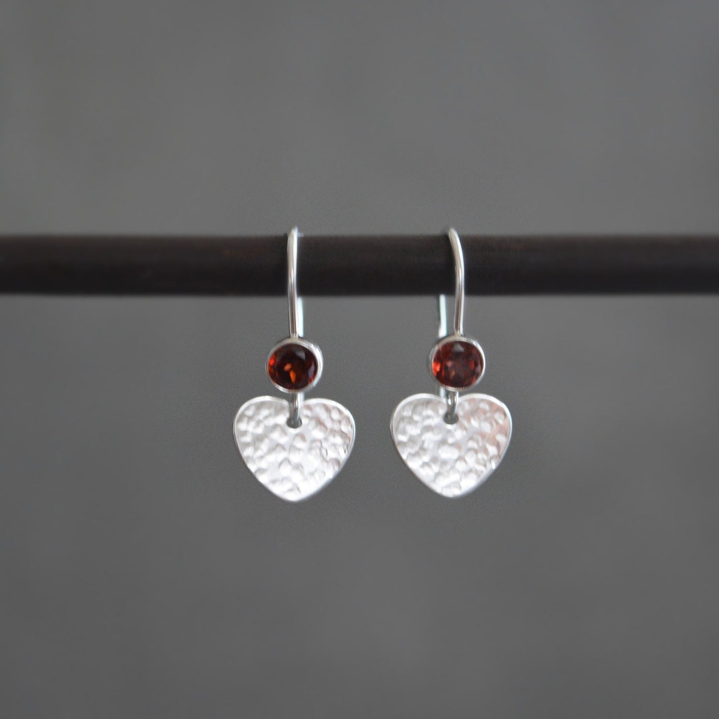 garnet sterling silver earrings with a textured heart