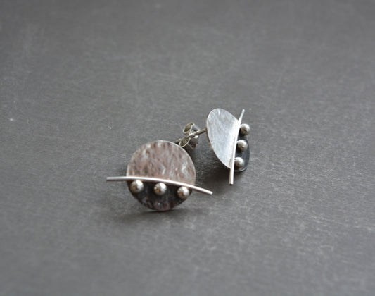 Sterling silver disc stud earrings.