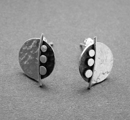 Sterling silver disc stud earrings.