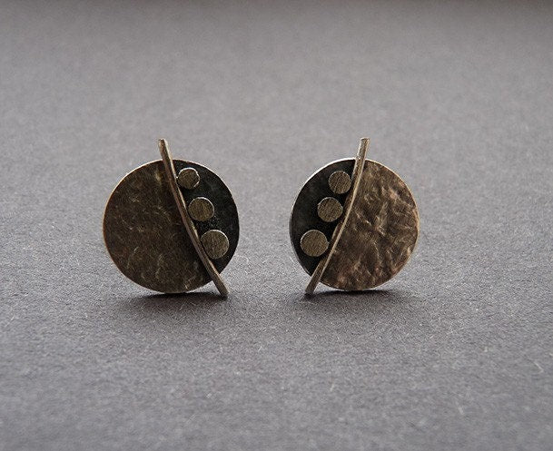 Sterling silver disc stud earrings.