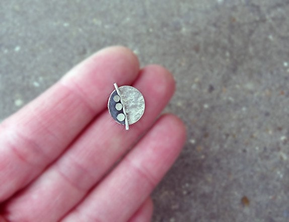 Sterling silver disc stud earrings.