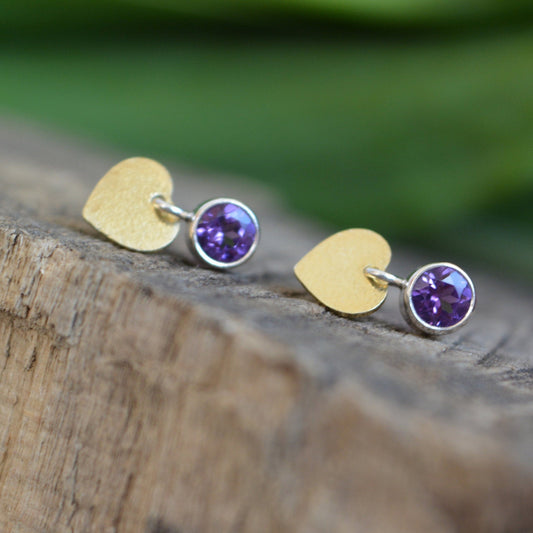 Amethyst sterling silver heart stud earrings.