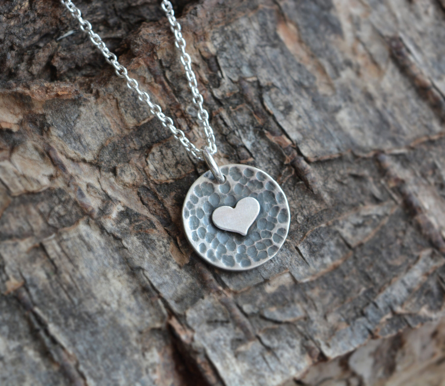 Sterling silver heart disc pendant