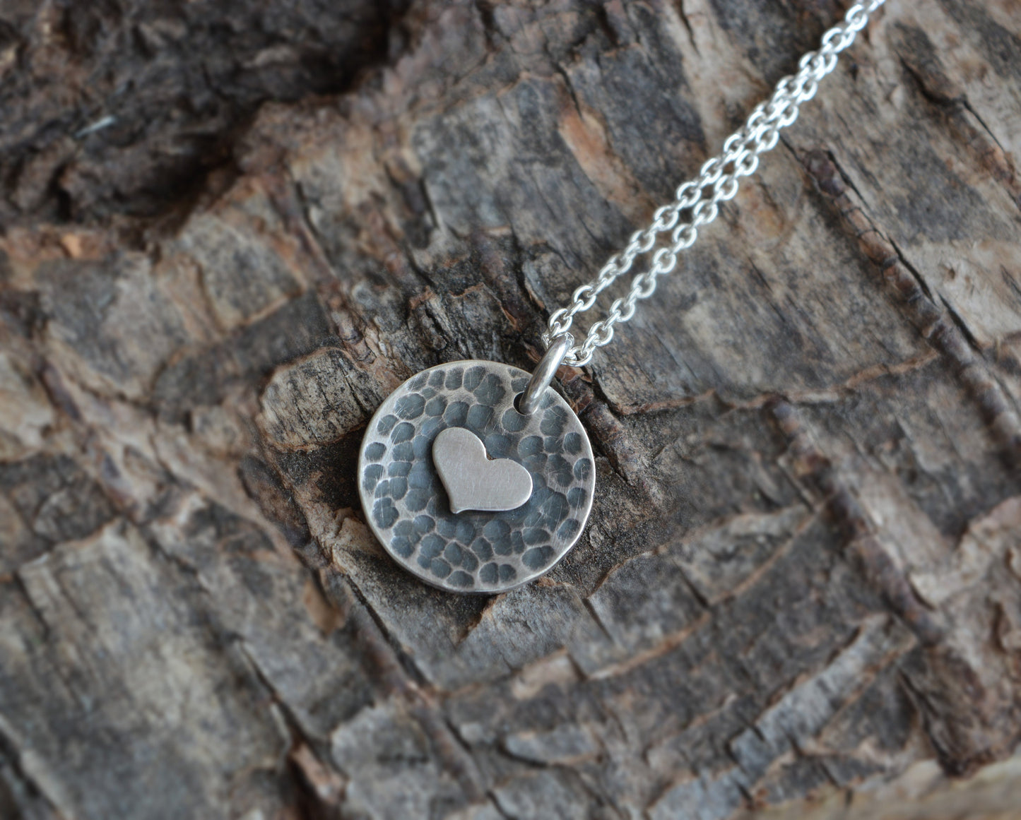 Sterling silver heart disc pendant