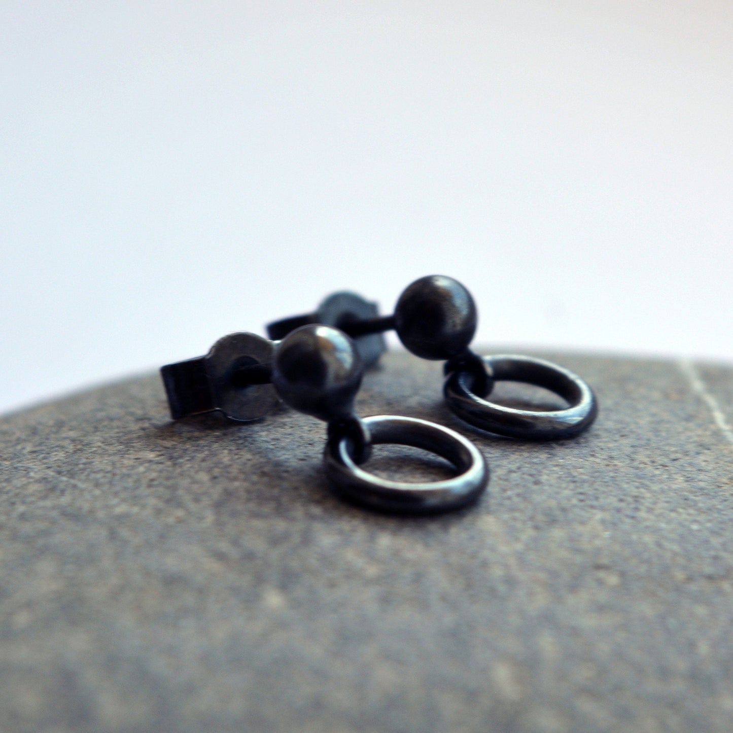 Oxidised sterling silver ball and circle stud earrings.