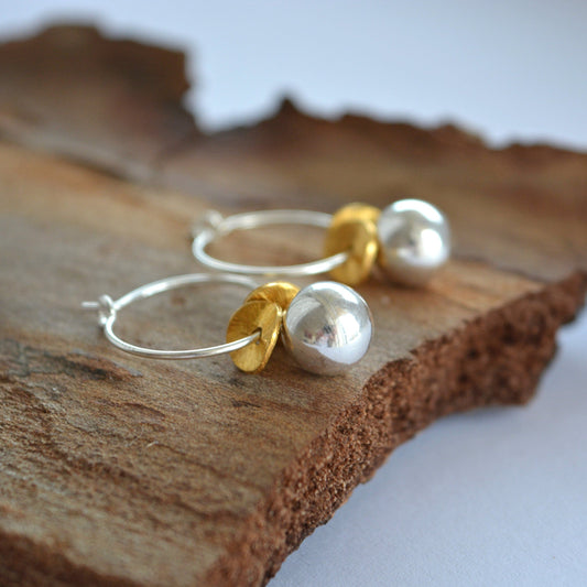 Sterling silver ball hoop earrings.