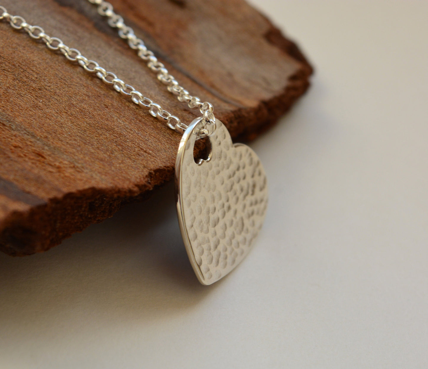 Hammered sterling silver heart necklace pendant.