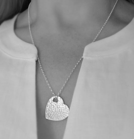 Hammered sterling silver heart necklace pendant.