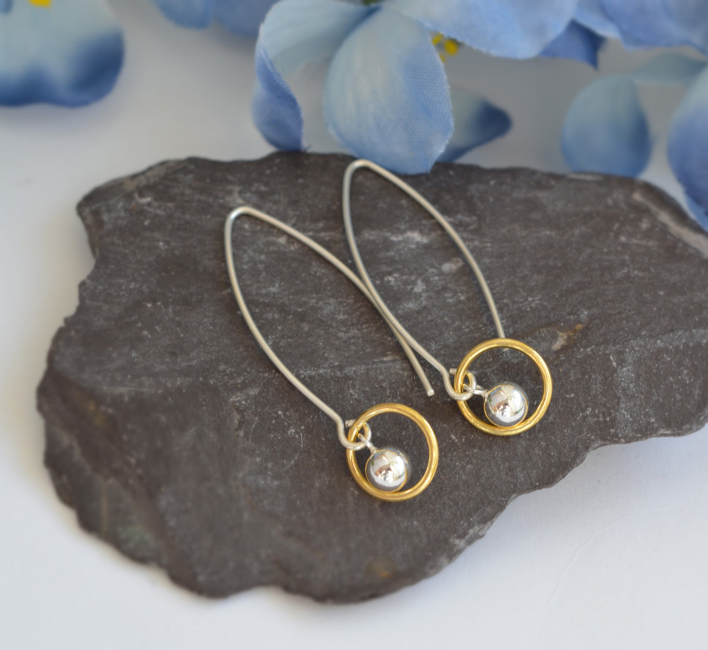 Ball and circle sterling silver and 24k gold vermeil dangle earrings.